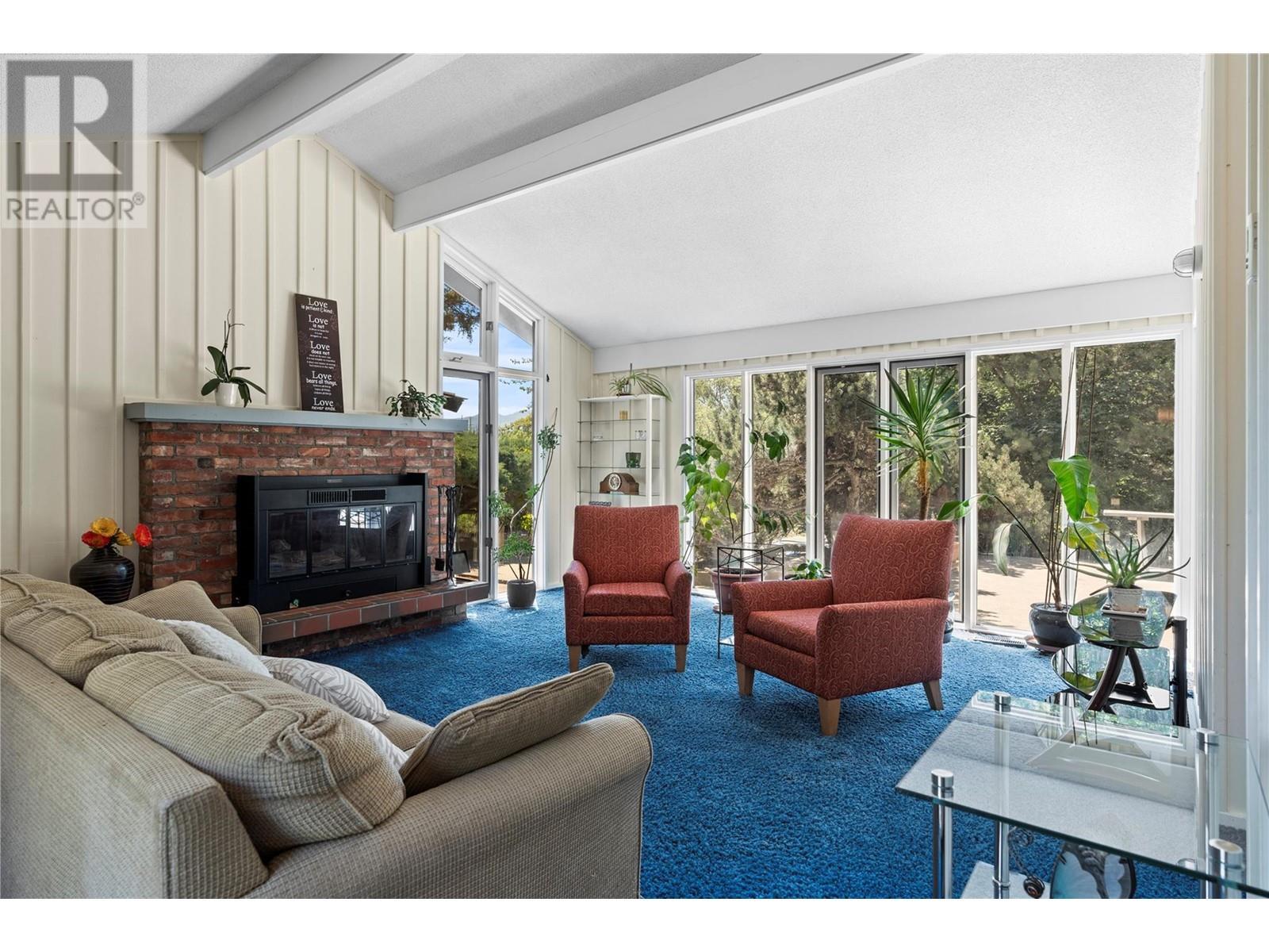 Primary Home Living Room - 1451 Mountview Road, Vernon, BC - Indoor Photo Showing Living Room With Fireplace