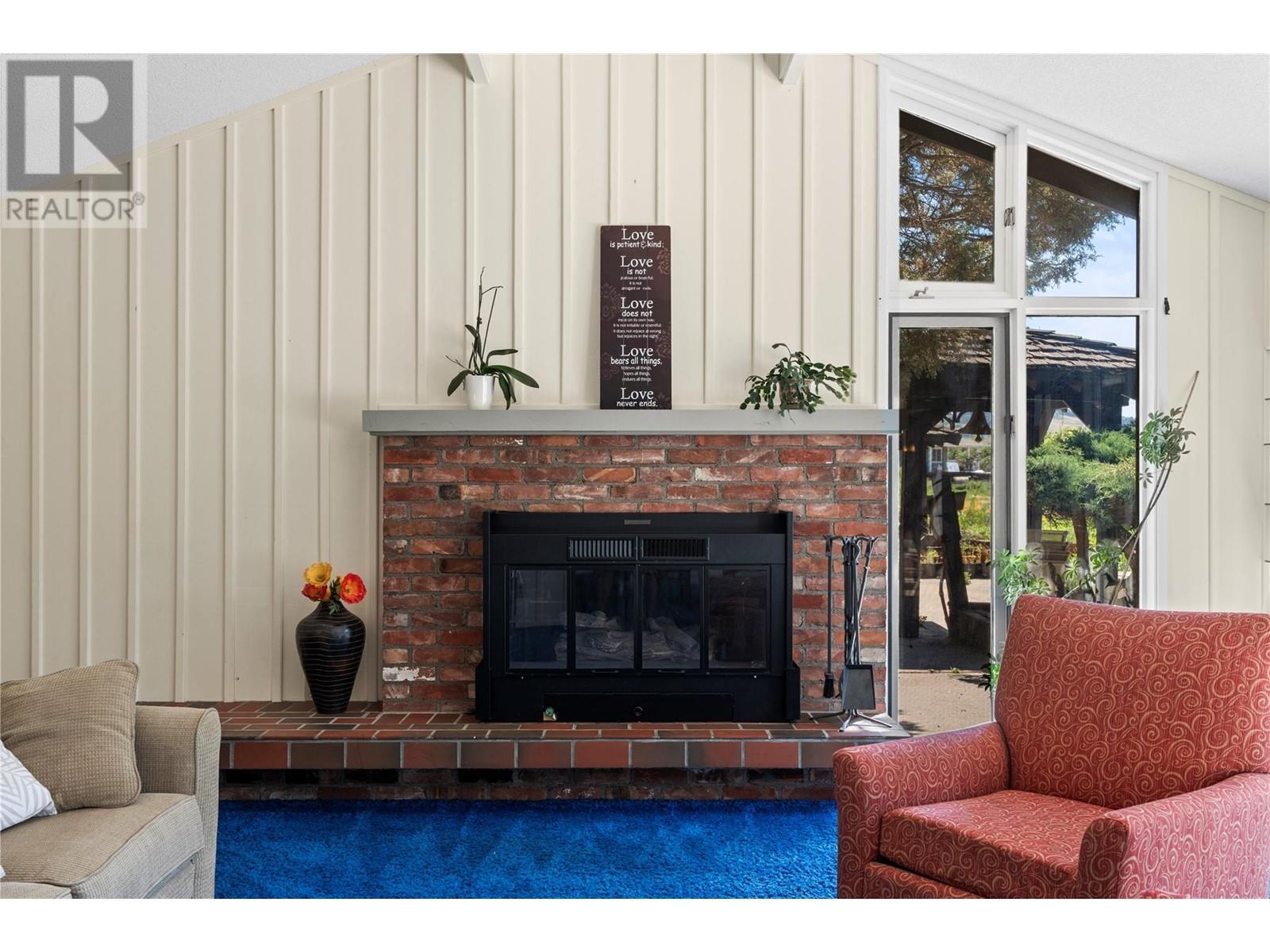 Primary Home Living Room - 1451 Mountview Road, Vernon, BC - Indoor Photo Showing Living Room With Fireplace