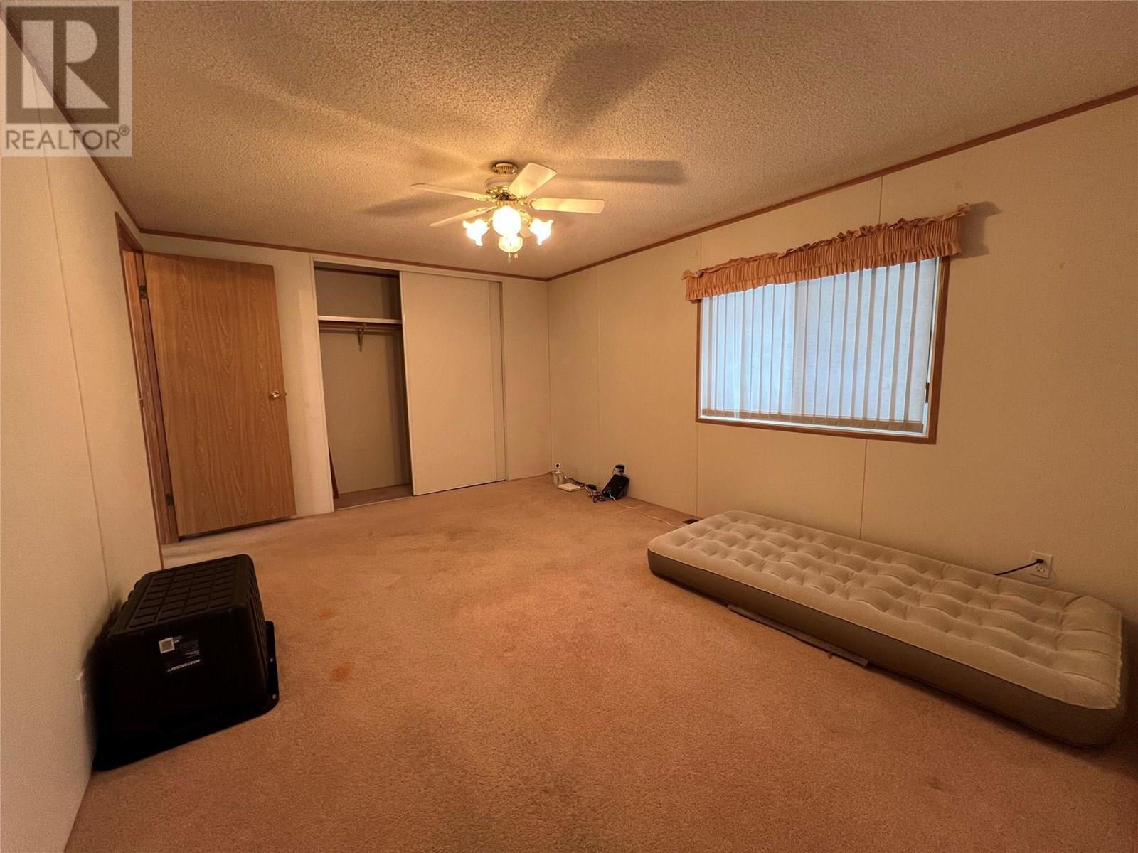 Primary bedroom, other side - 5484 25 Avenue Unit# 123, Vernon, BC