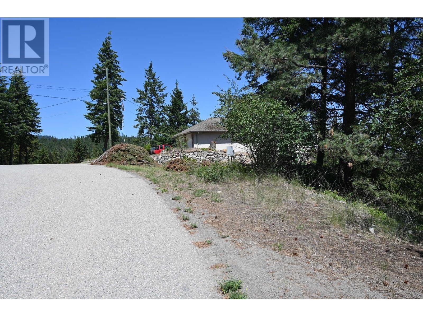 Columbia Way road to lot entry. - 10579 Columbia Way, Vernon, BC