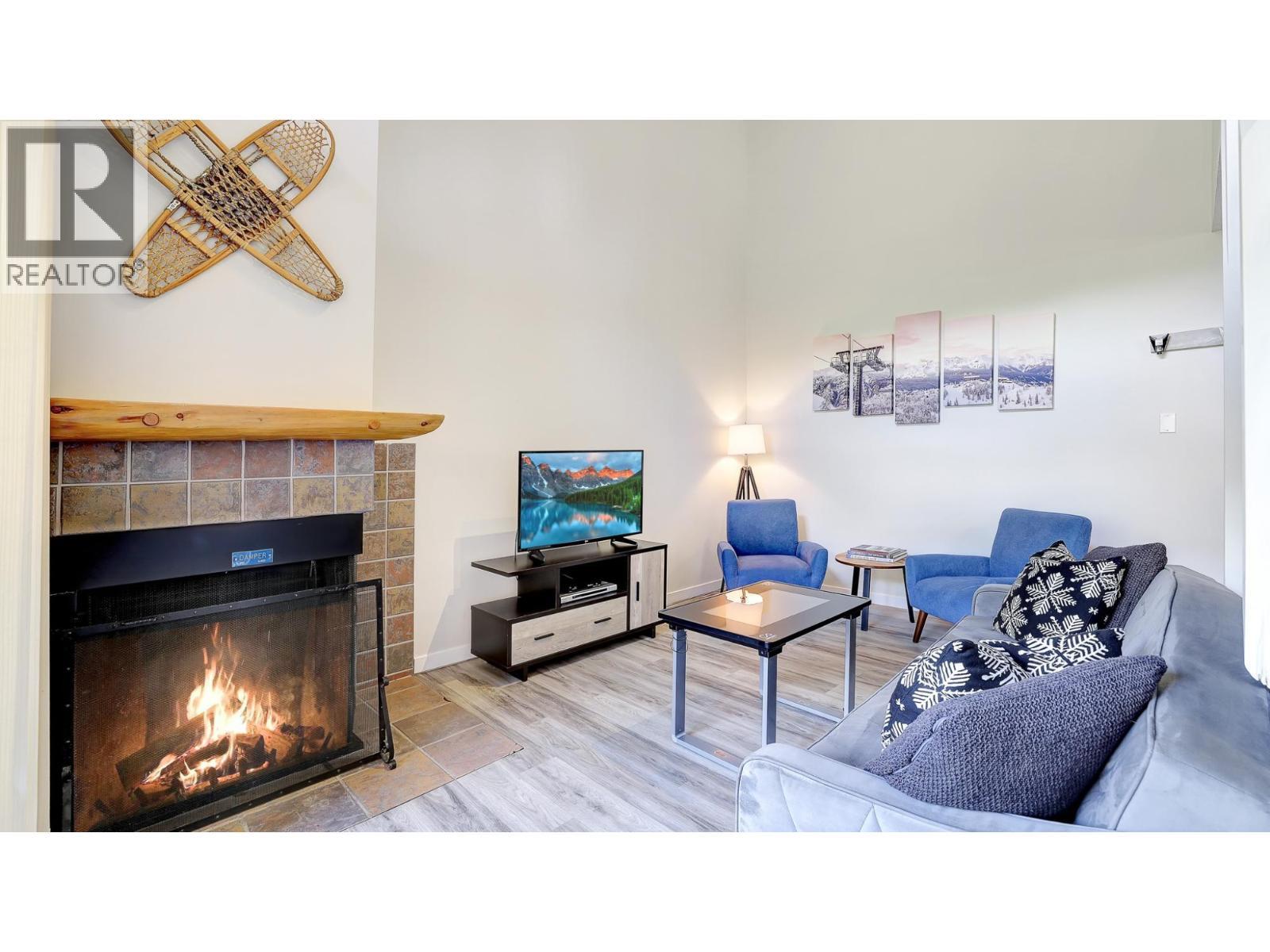 2035 Panorama Drive Unit# 237, Panorama, BC - Indoor Photo Showing Living Room With Fireplace