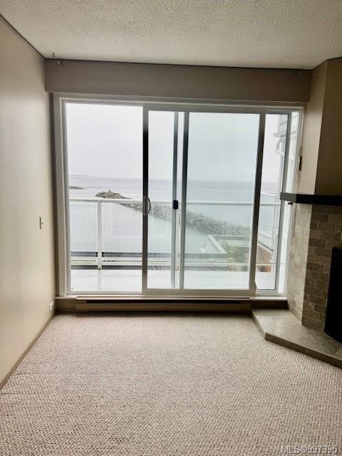 407-3555 Outrigger Rd, Nanoose Bay, BC - Indoor Photo Showing Other Room With Fireplace