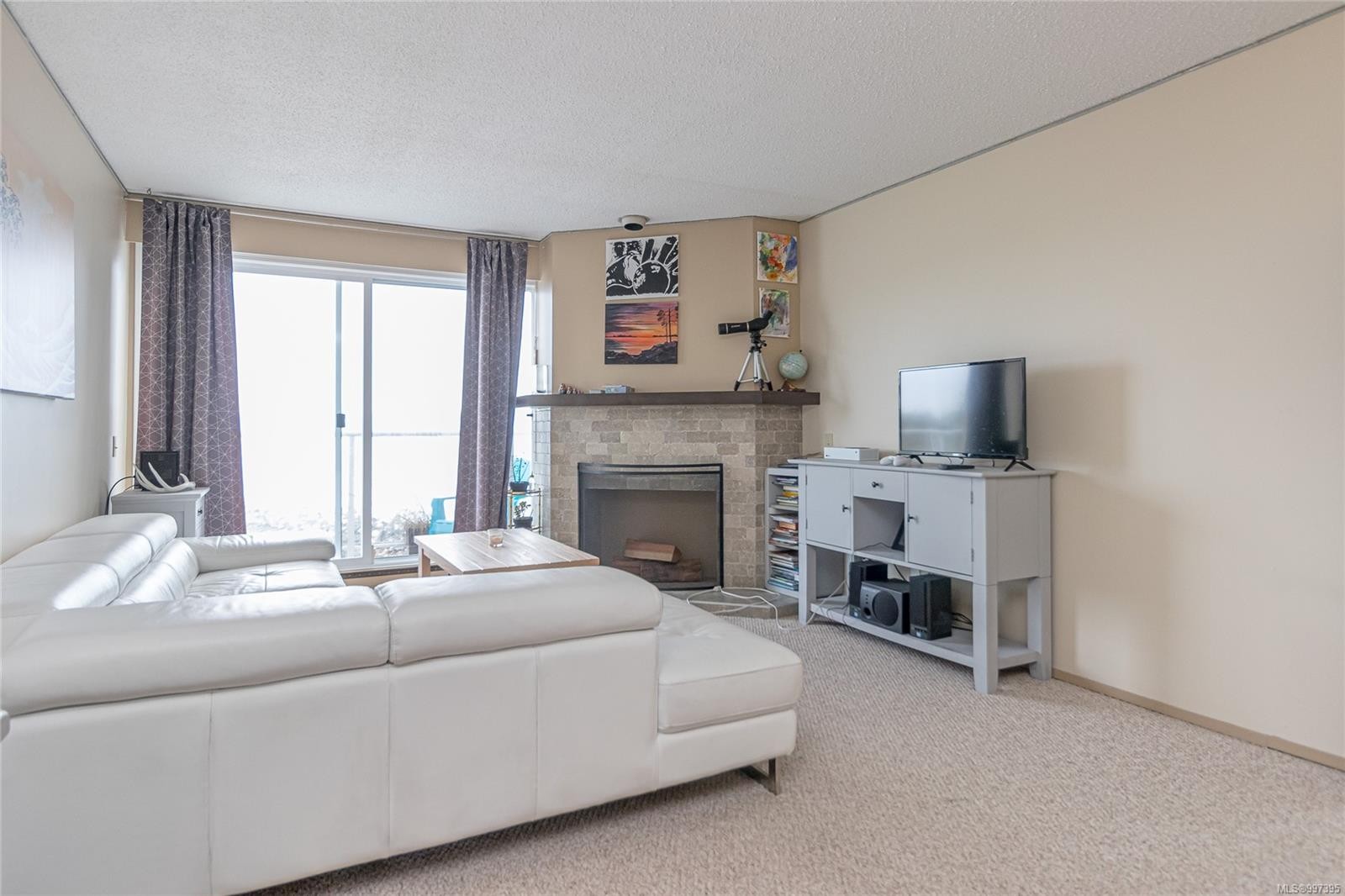 407-3555 Outrigger Rd, Nanoose Bay, BC - Indoor Photo Showing Living Room With Fireplace