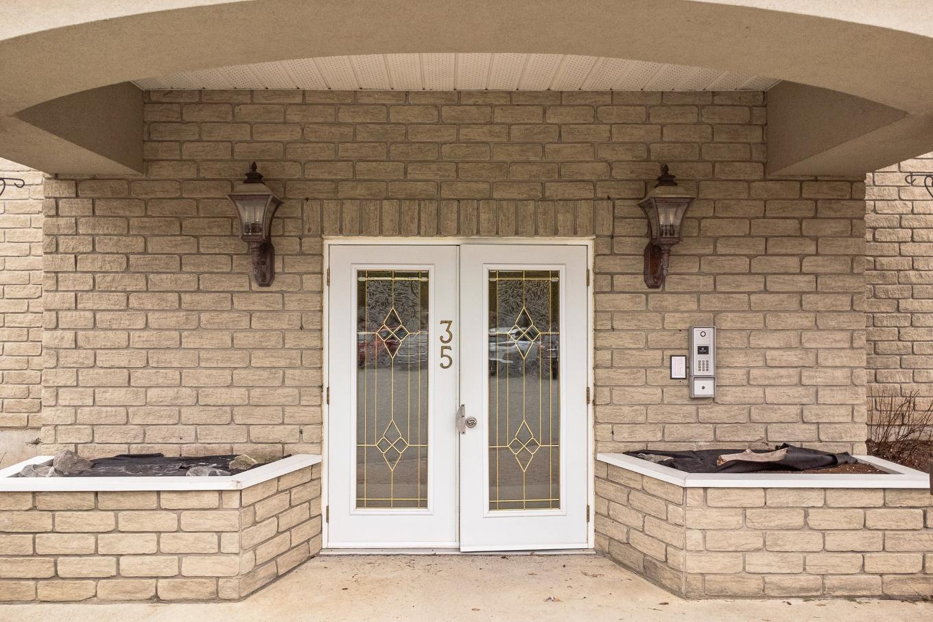 Exterior entrance - 101-35 Rue Du Quai, Magog, QC - Outdoor With Exterior