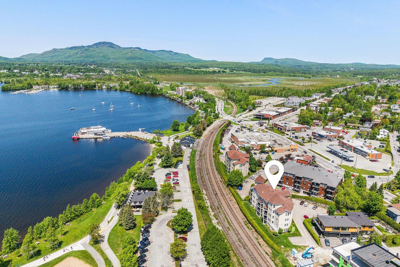 Aerial photo - 101-35 Rue Du Quai, Magog, QC - Outdoor With Body Of Water With View