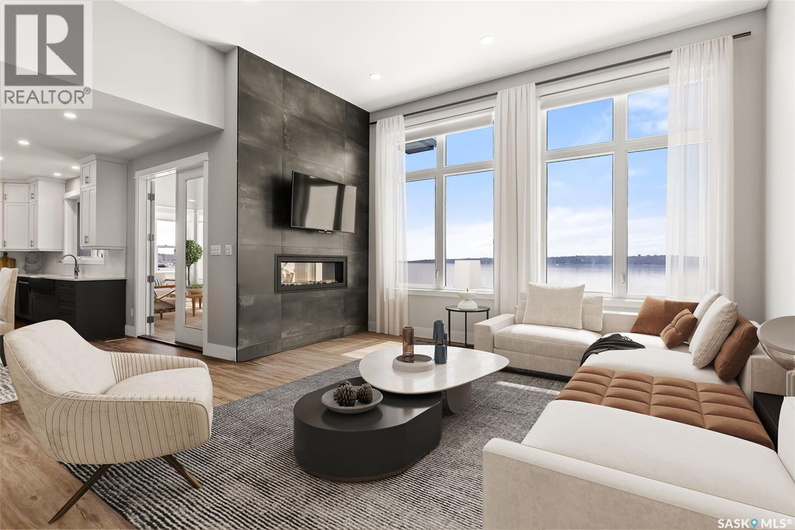 332 Mihr Bay, Mckillop Rm No. 220, SK - Indoor Photo Showing Living Room With Fireplace