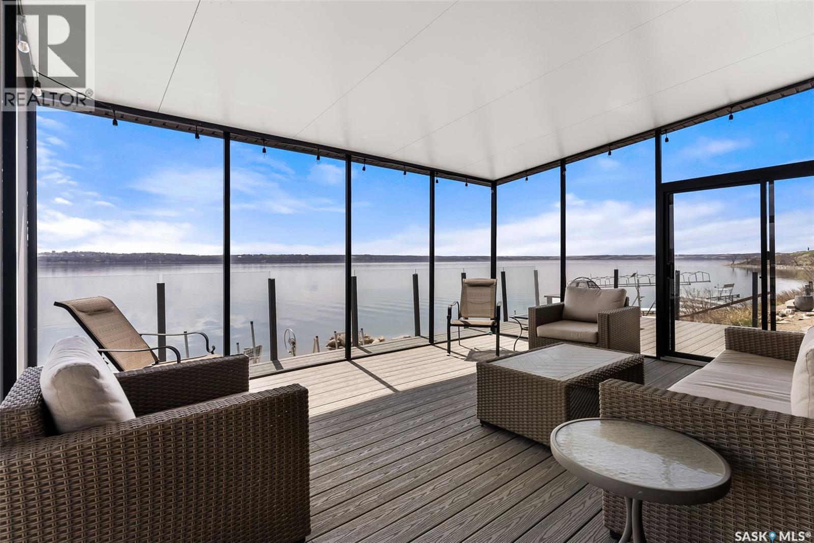 332 Mihr Bay, Mckillop Rm No. 220, SK - With Body Of Water With Deck Patio Veranda With Exterior