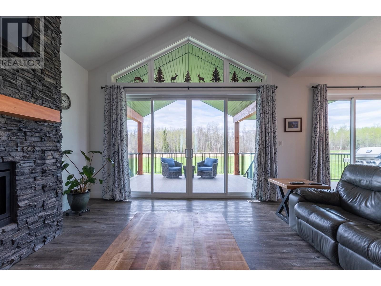 7400 Taborview Drive, Prince George, BC - Indoor Photo Showing Living Room With Fireplace