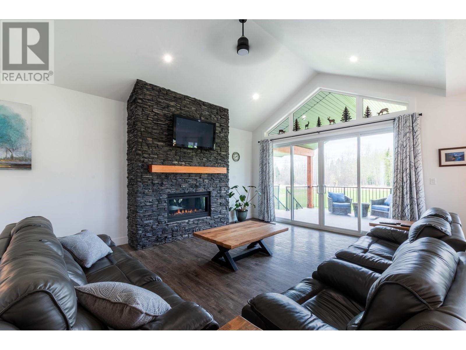 7400 Taborview Drive, Prince George, BC - Indoor Photo Showing Living Room With Fireplace
