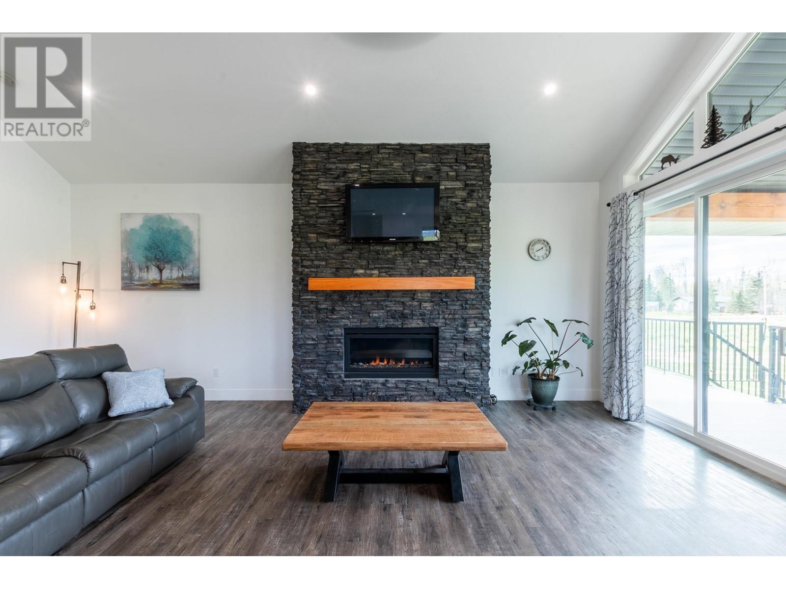 7400 Taborview Drive, Prince George, BC - Indoor Photo Showing Living Room With Fireplace
