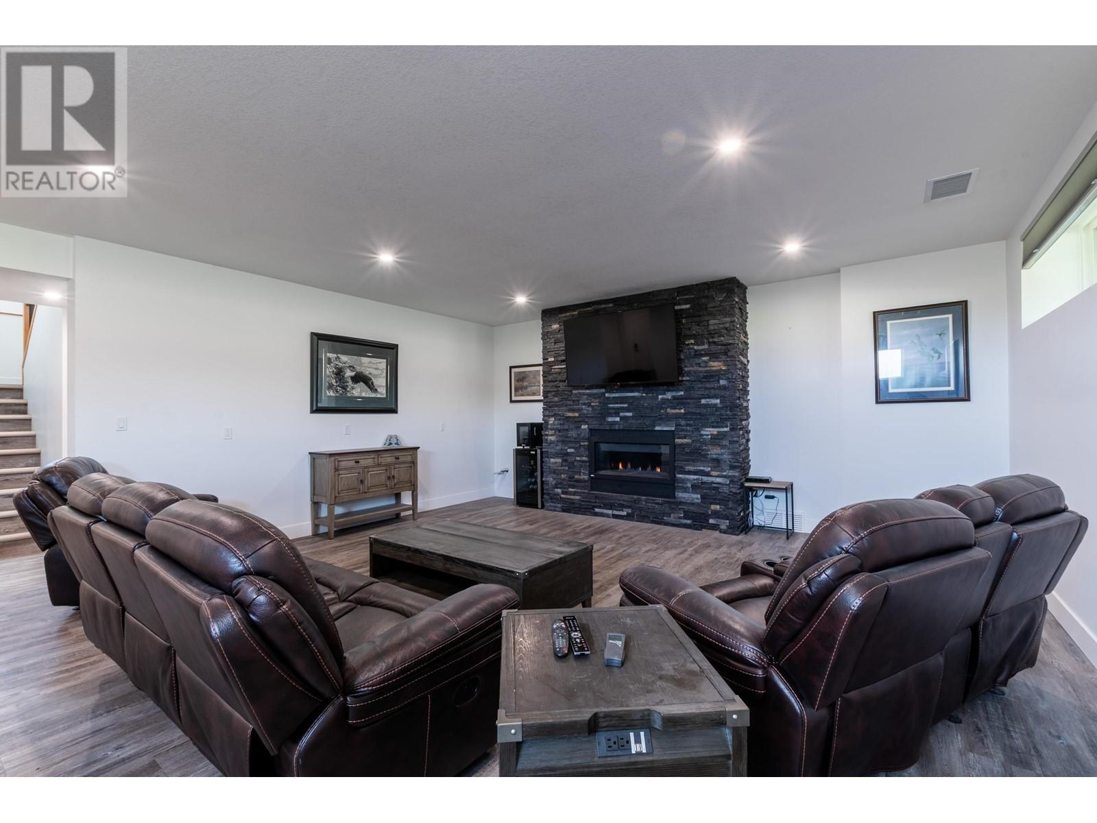 7400 Taborview Drive, Prince George, BC - Indoor Photo Showing Living Room With Fireplace