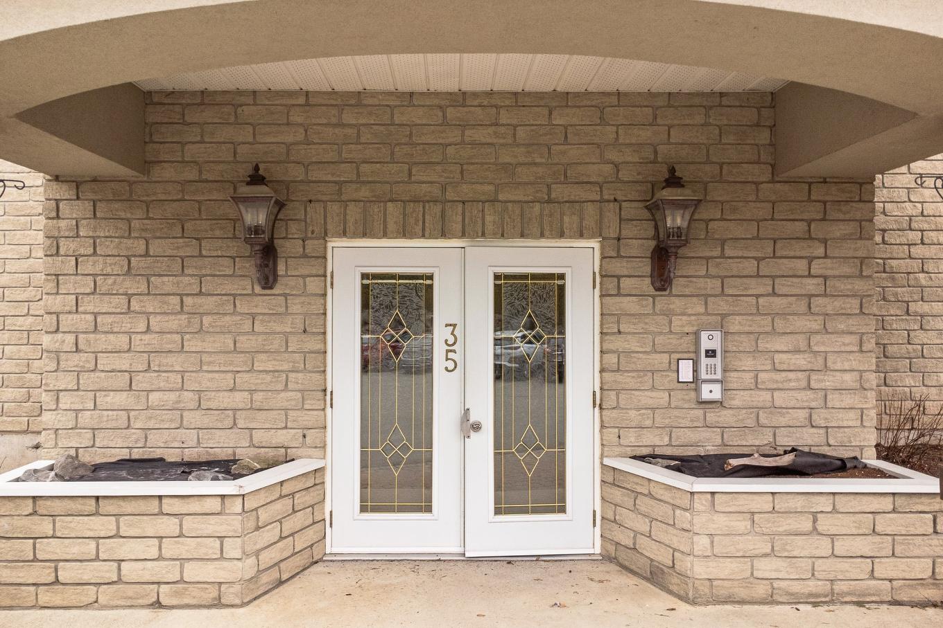 Exterior entrance - 201-35 Rue Du Quai, Magog, QC - Outdoor With Exterior