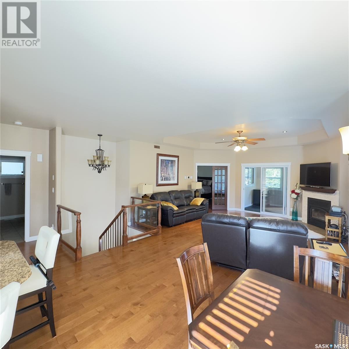 82 Estates Drive, Elk Ridge, SK - Indoor With Fireplace