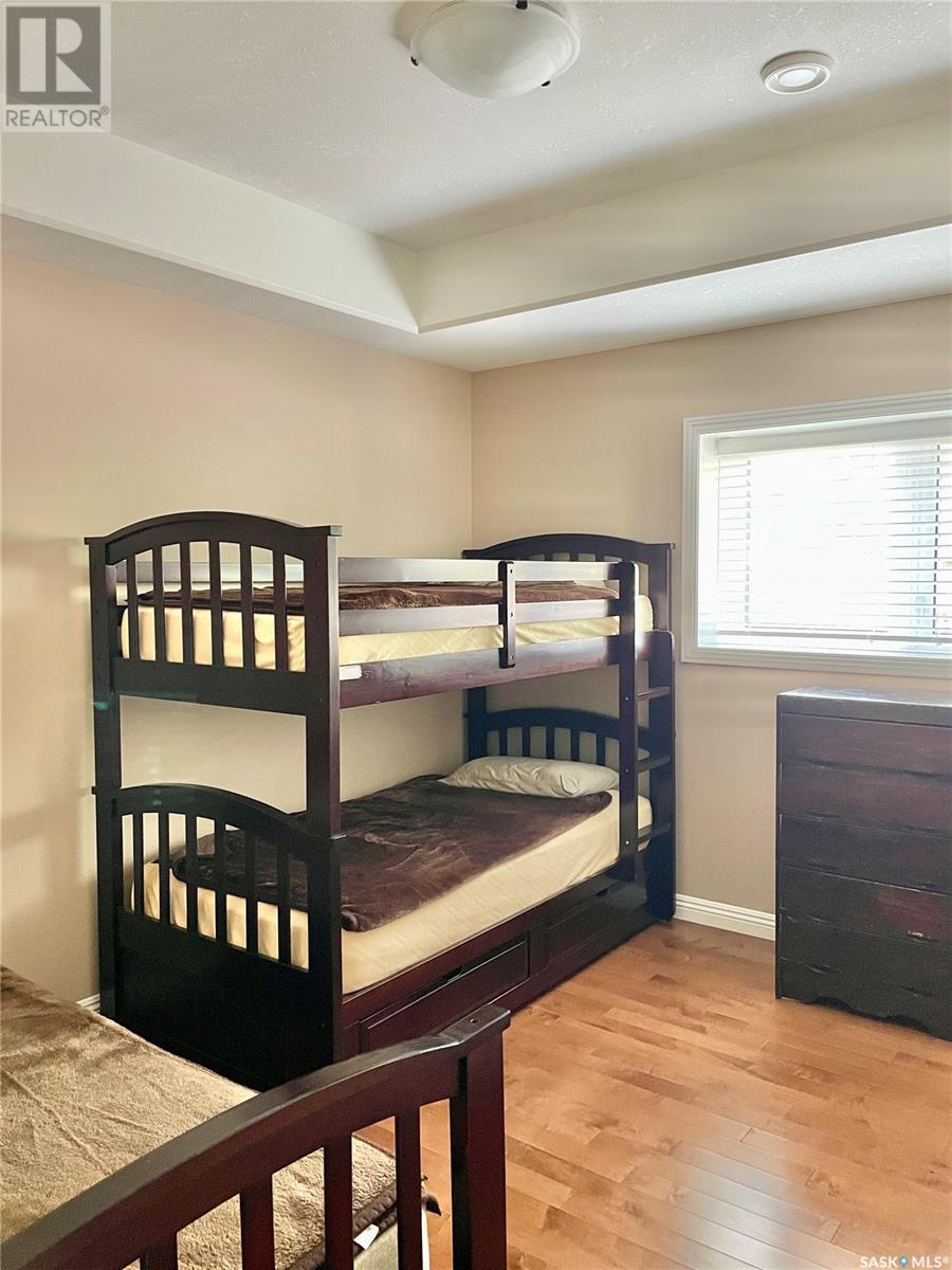82 Estates Drive, Elk Ridge, SK - Indoor Photo Showing Bedroom