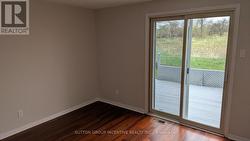 Bedroom walkout to deck and view of open area -
