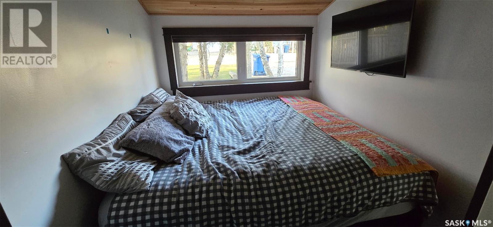 34 Okadoca Street, Kenosee Lake, SK - Indoor Photo Showing Bedroom