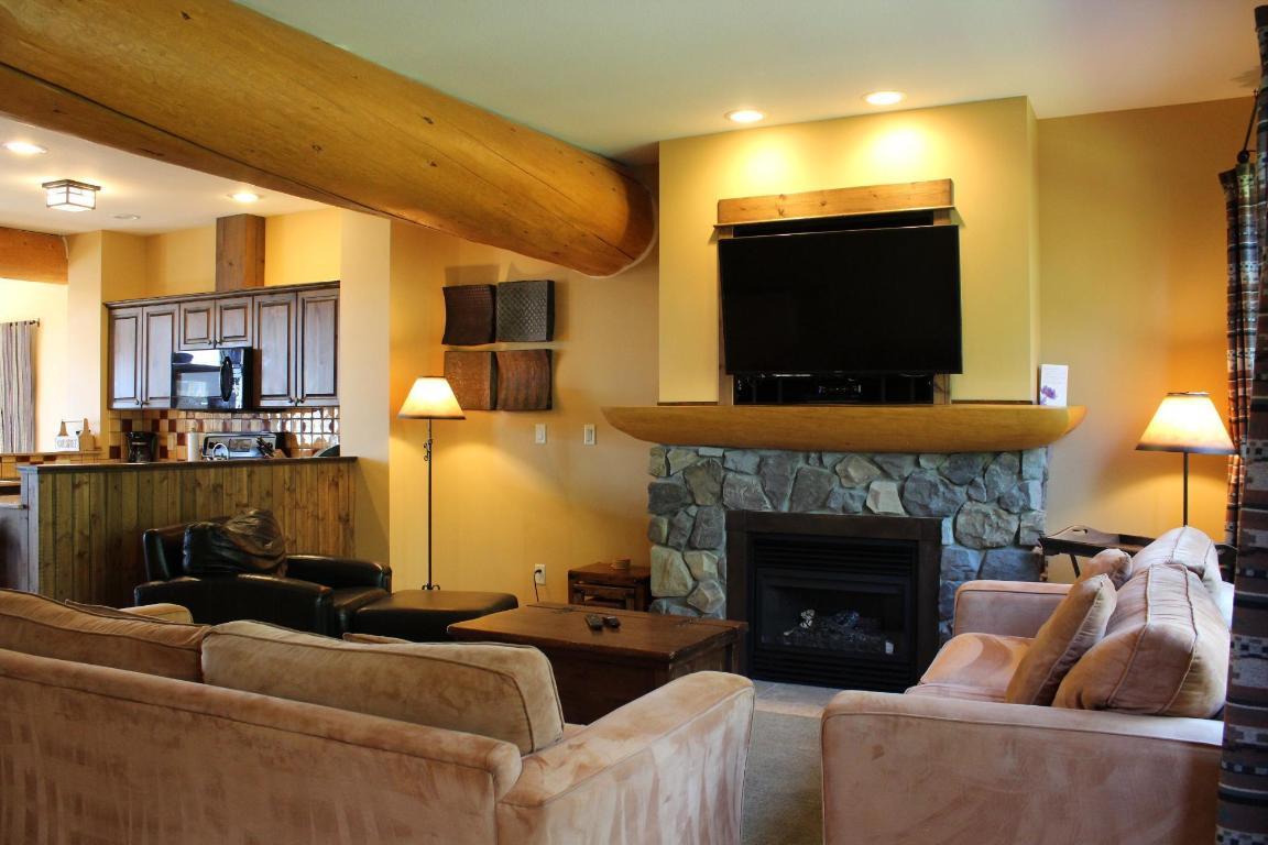 O3-C-1351 Gerry Sorensen Way, Kimberley, BC - Indoor Photo Showing Living Room With Fireplace