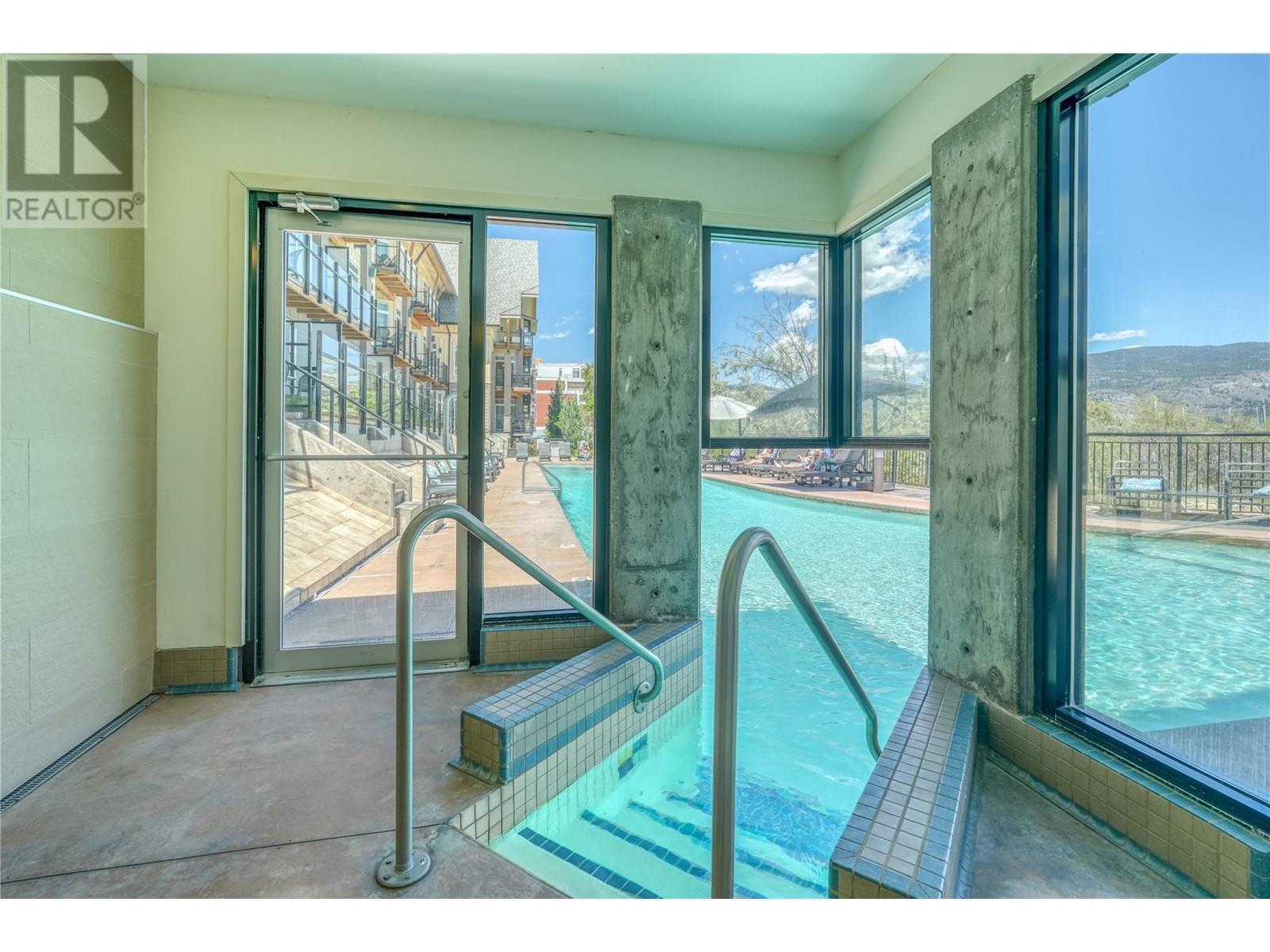 12811 Lakeshore Drive S Unit# 410/411, Summerland, BC - Indoor Photo Showing Other Room With In Ground Pool