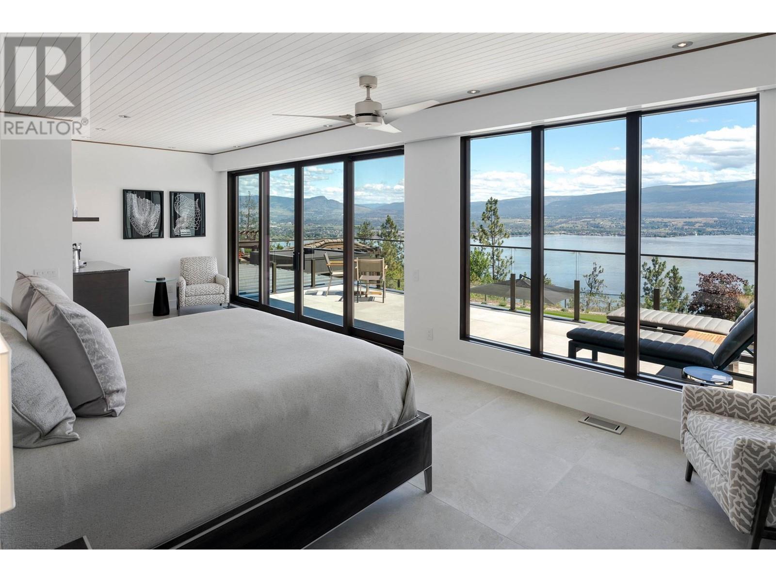 Second bedroom on upper level - 2463 Thacker Drive, West Kelowna, BC - Indoor Photo Showing Bedroom