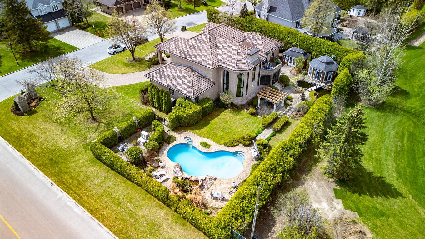 Overall view - 303 Rue Alphonse-Desjardins, Montréal (L'Île-Bizard/Sainte-Geneviève), QC - Outdoor With In Ground Pool