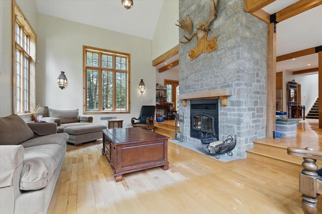 Living room - 10 Ch. Du Frère-André, Brownsburg-Chatham, QC - Indoor Photo Showing Living Room With Fireplace