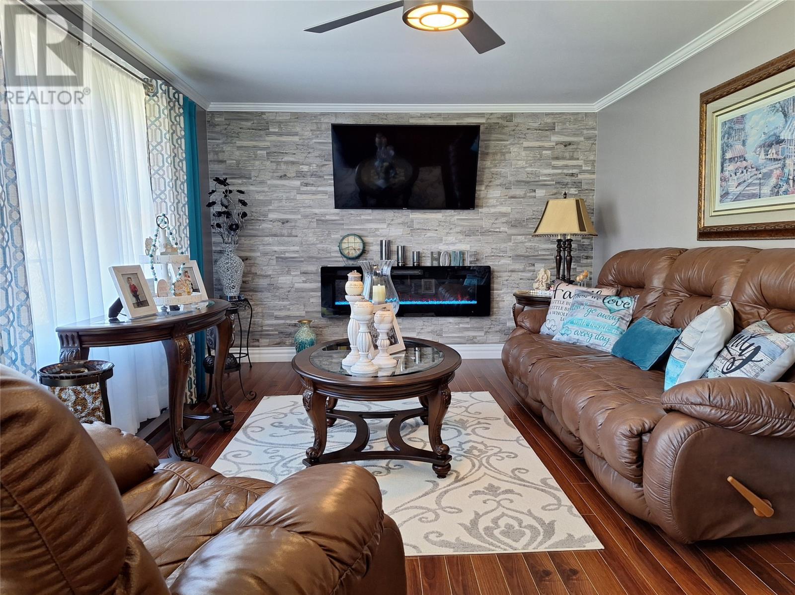 673 Oceanview Drive, Cape St. George, NL - Indoor Photo Showing Living Room With Fireplace