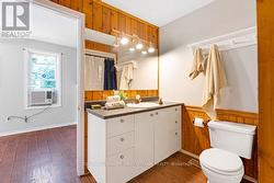 Primary bedroom cheater door to 4-pc bathroom -