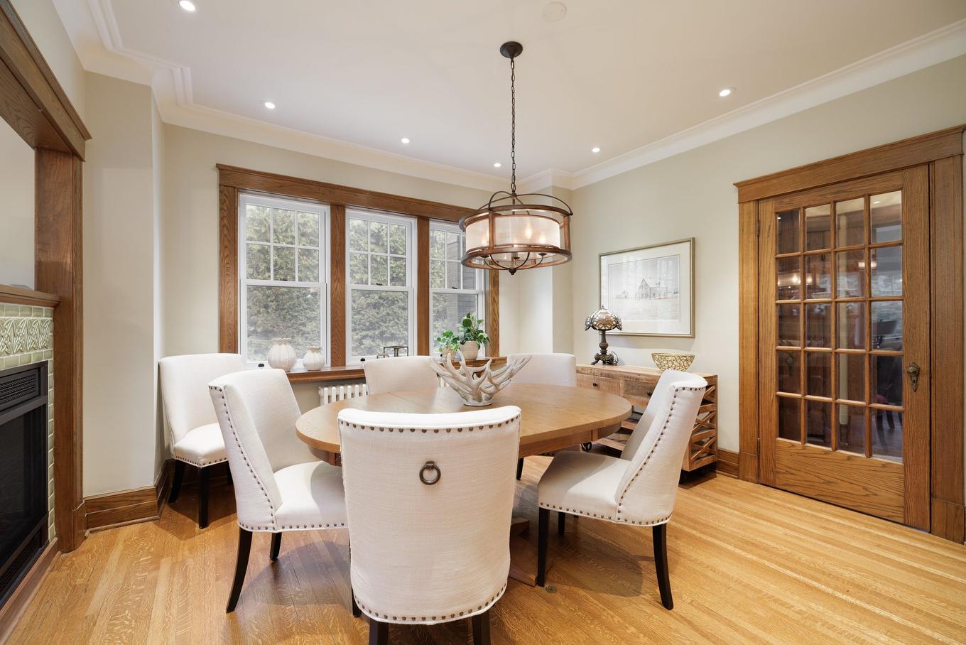 Dining room - 130 Av. Ballantyne N., Montréal-Ouest, QC - Indoor Photo Showing Dining Room With Fireplace