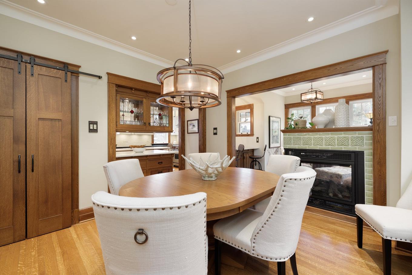 Dining room - 130 Av. Ballantyne N., Montréal-Ouest, QC - Indoor Photo Showing Dining Room With Fireplace