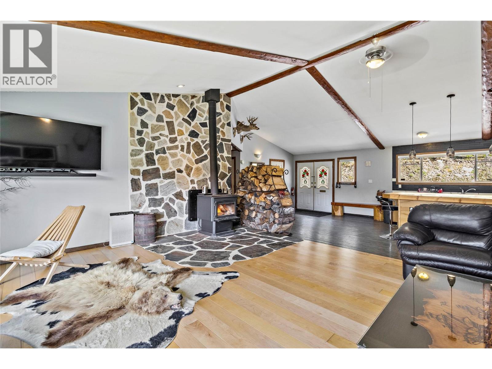 1446 Nittel Road, Seymour Arm, BC - Indoor Photo Showing Living Room With Fireplace