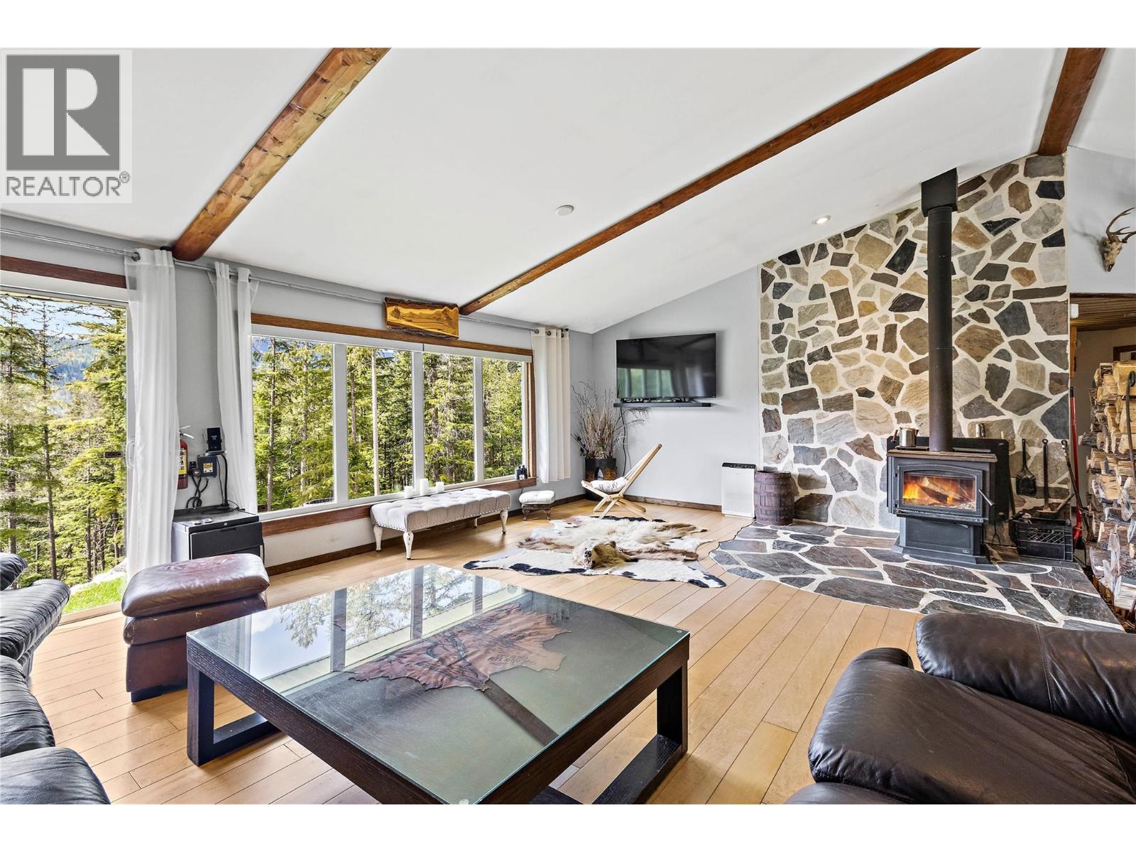 1446 Nittel Road, Seymour Arm, BC - Indoor Photo Showing Living Room With Fireplace