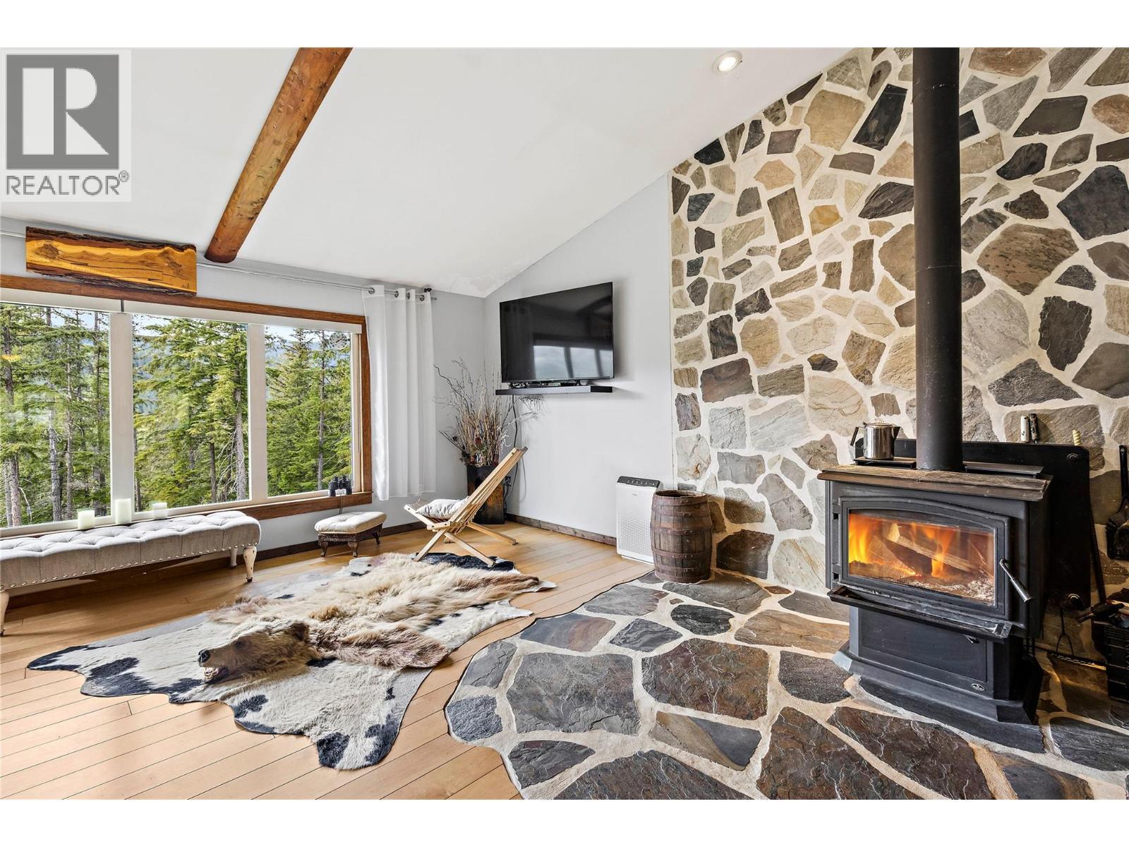 1446 Nittel Road, Seymour Arm, BC - Indoor Photo Showing Living Room With Fireplace