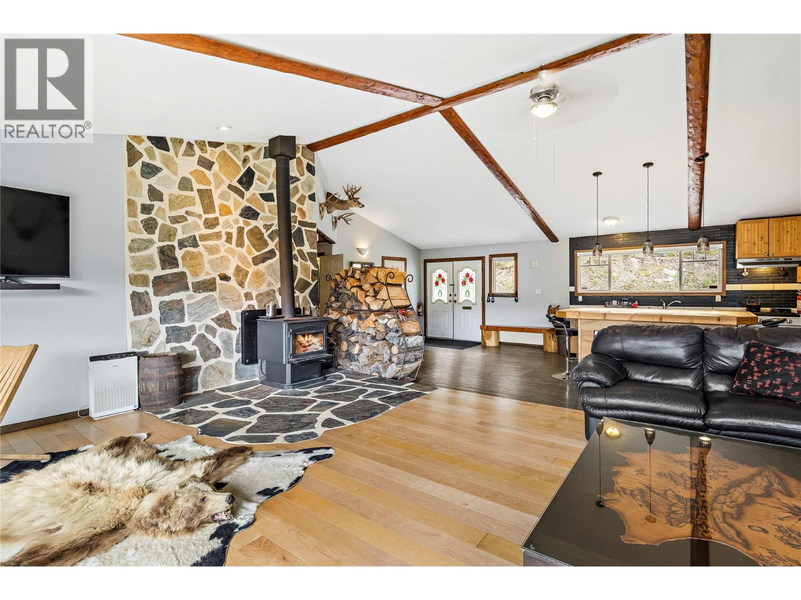 1446 Nittel Road, Seymour Arm, BC - Indoor Photo Showing Living Room With Fireplace