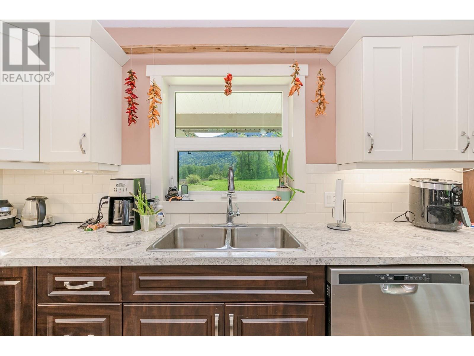 51 Monks Road, Grindrod, BC - Indoor Photo Showing Kitchen With Double Sink