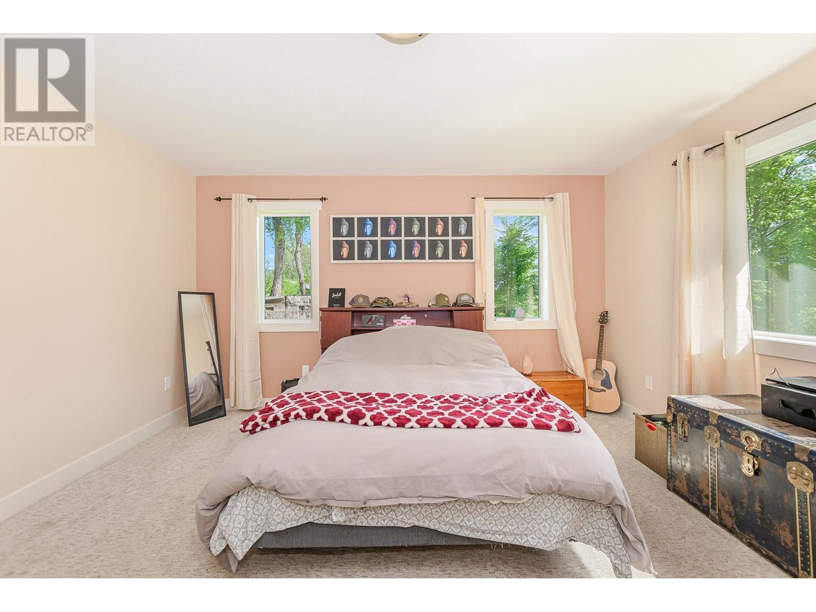 51 Monks Road, Grindrod, BC - Indoor Photo Showing Bedroom