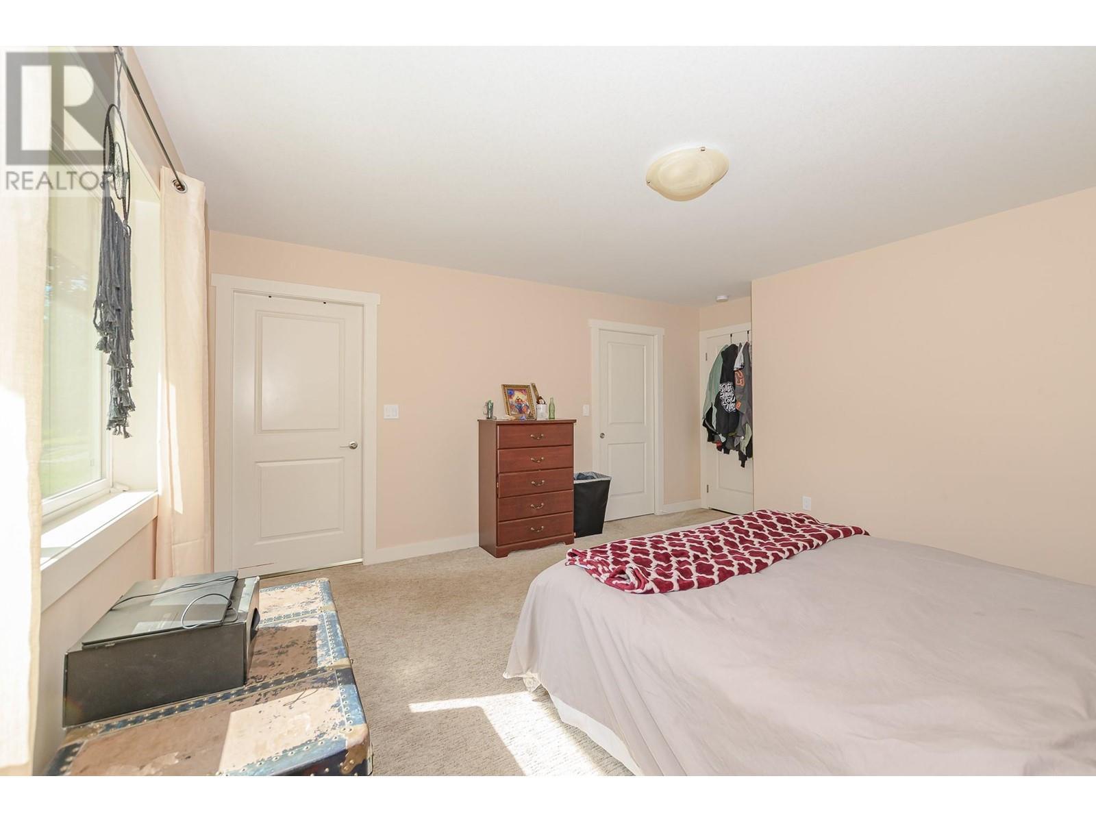 51 Monks Road, Grindrod, BC - Indoor Photo Showing Bedroom