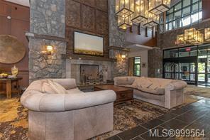 236/238 C-1999 Country Club Way, Langford, BC - Indoor With Fireplace