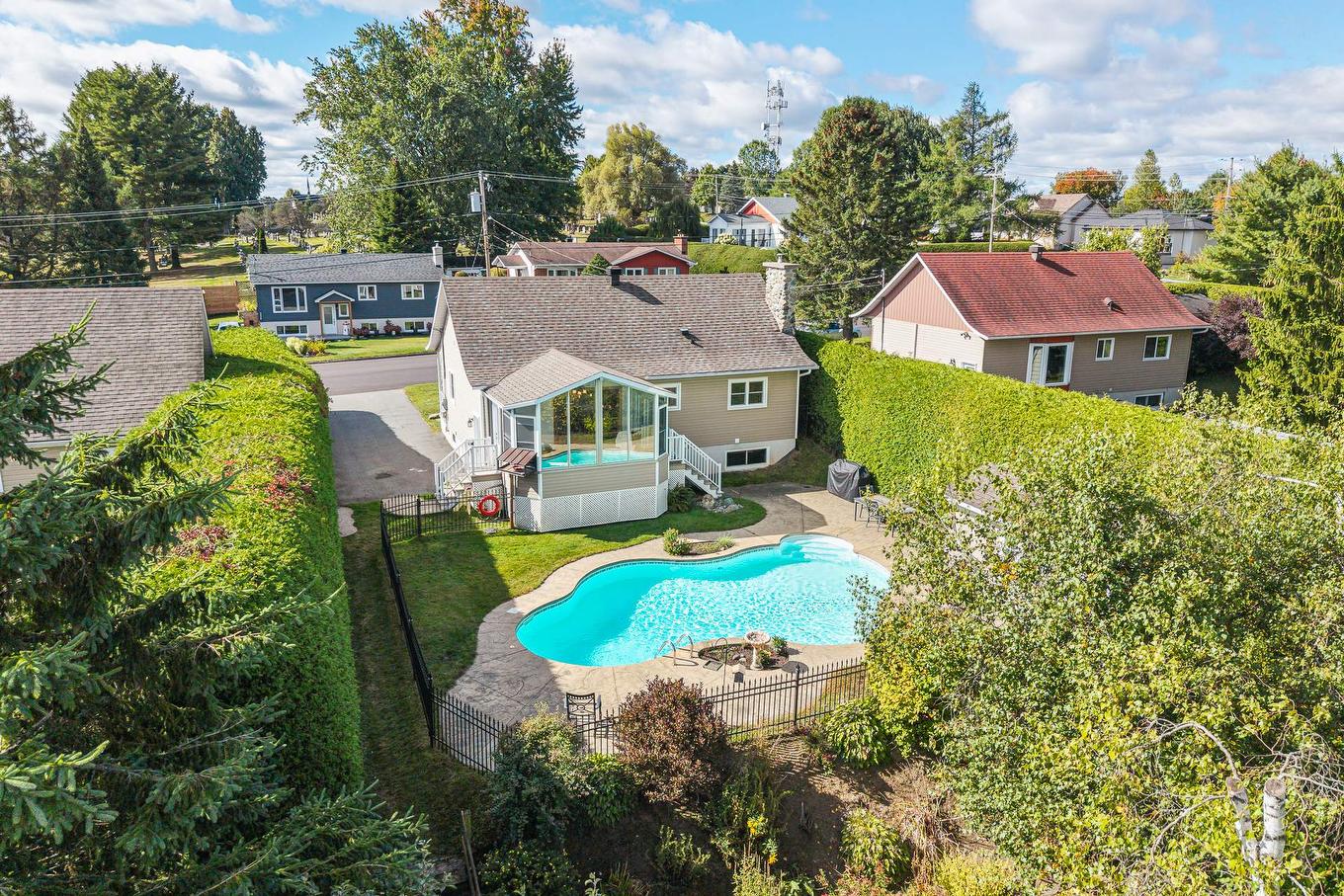 Back facade - 339 Rue Rivard, Magog, QC - Outdoor With In Ground Pool With Deck Patio Veranda