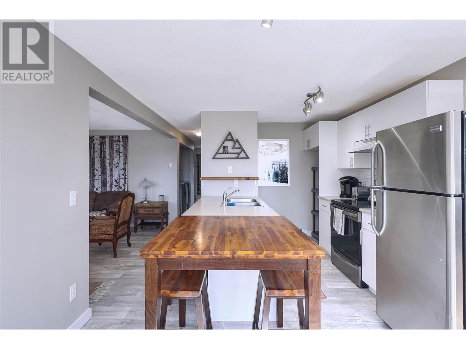 4817 Snow Pines Road Unit# D, Big White, BC - Indoor Photo Showing Kitchen With Double Sink