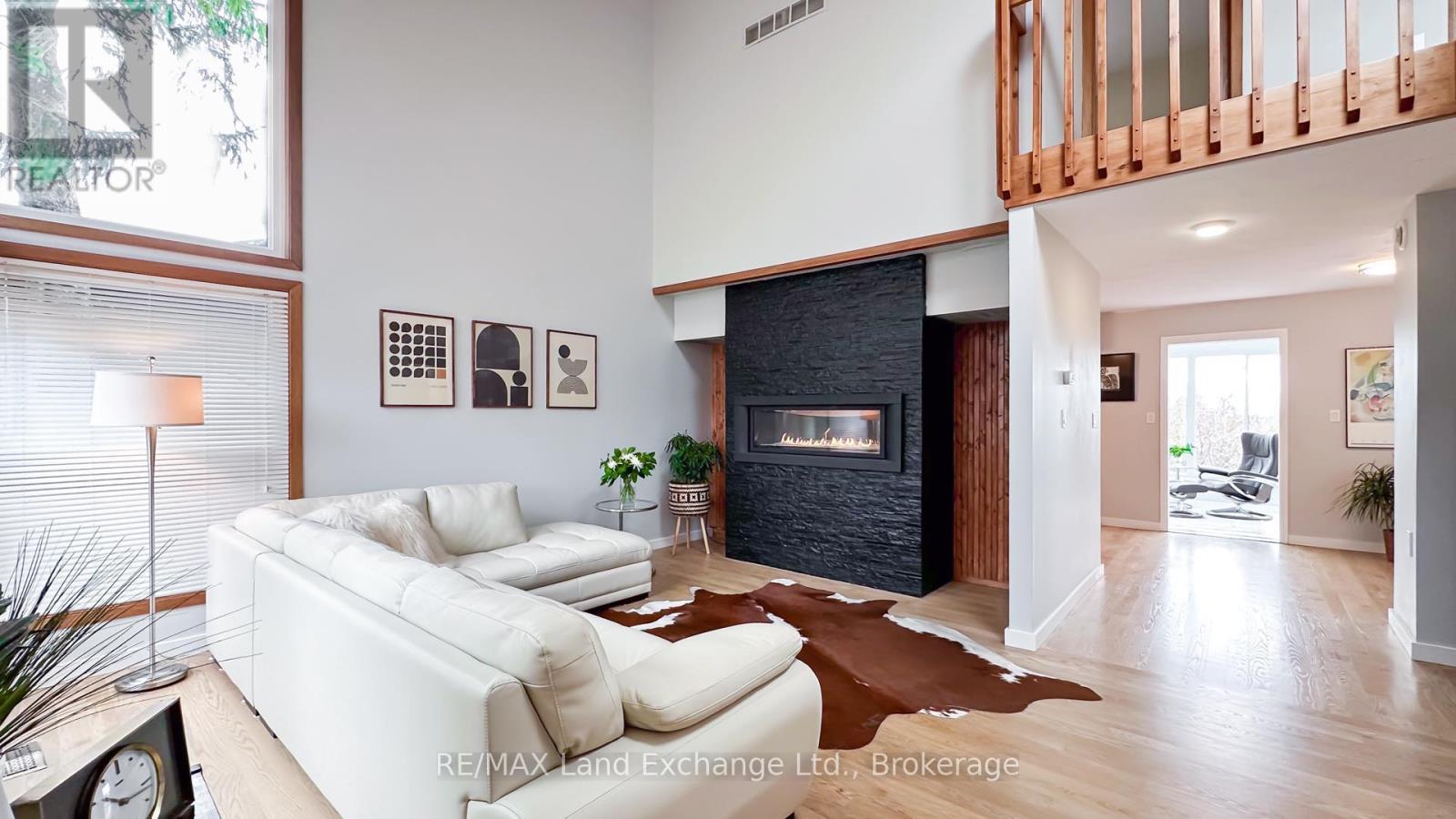 Great Room - 222 Penetangore Row, Kincardine, ON - Indoor Photo Showing Living Room With Fireplace