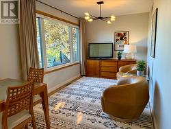 Den with Lake View -