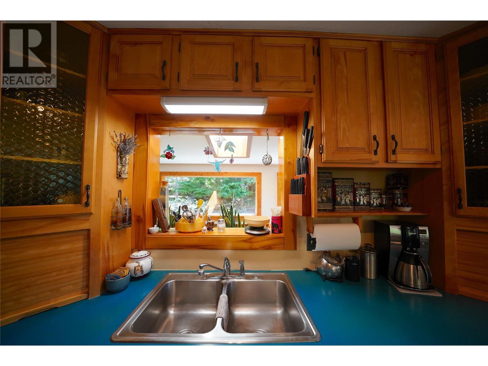 425 Alexander Road, Procter, BC - Indoor Photo Showing Kitchen With Double Sink