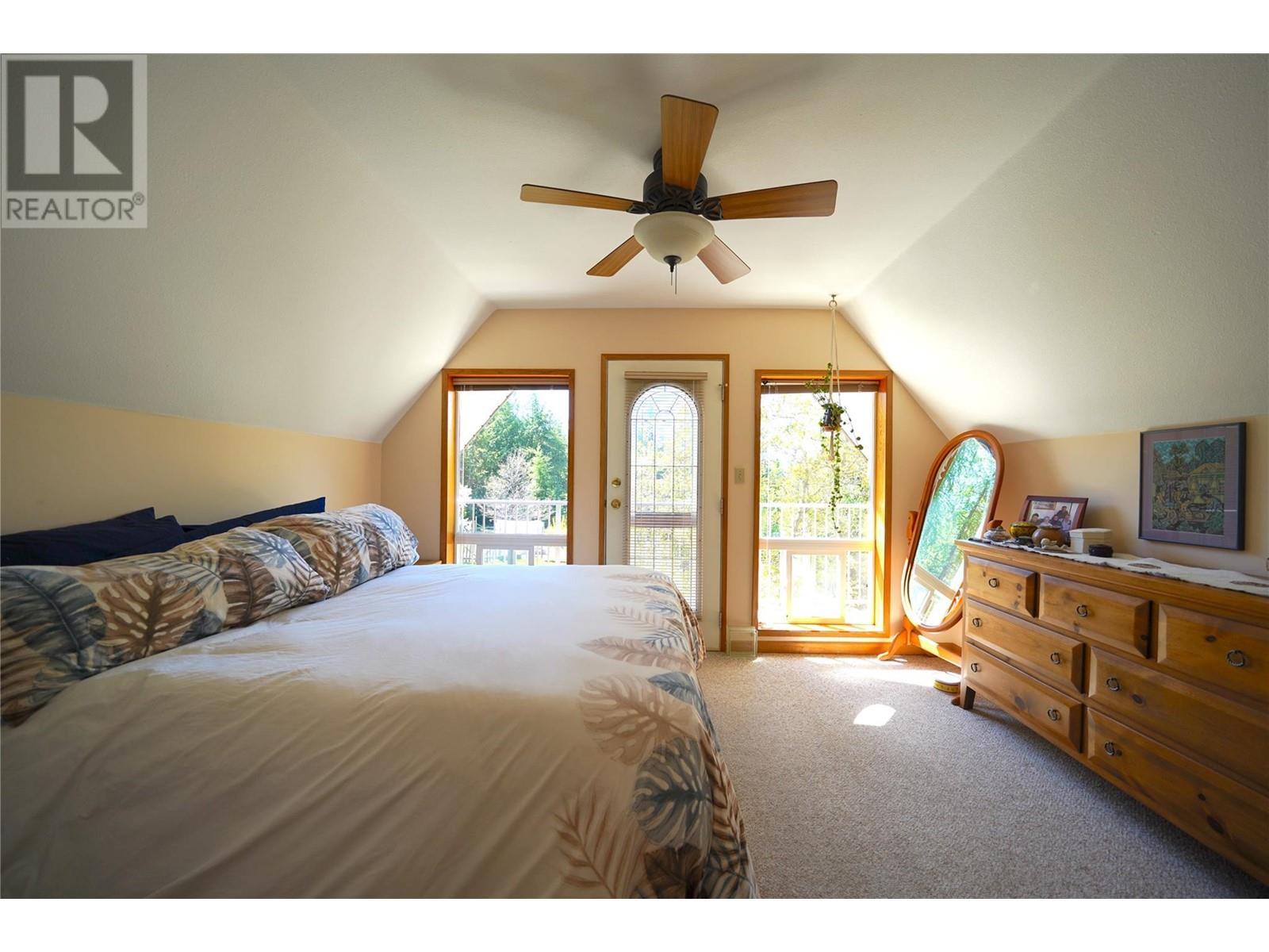 425 Alexander Road, Procter, BC - Indoor Photo Showing Bedroom