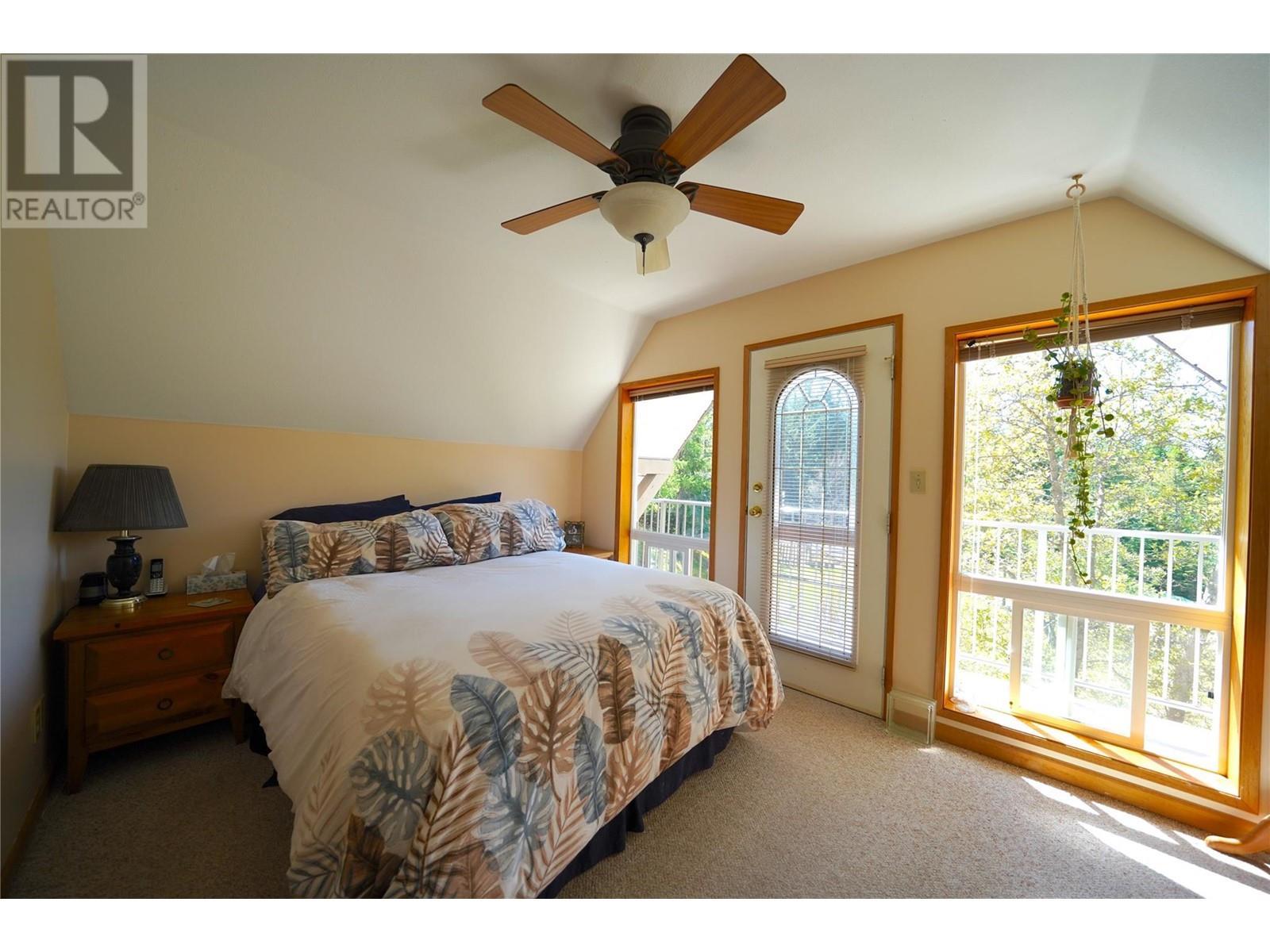 425 Alexander Road, Procter, BC - Indoor Photo Showing Bedroom