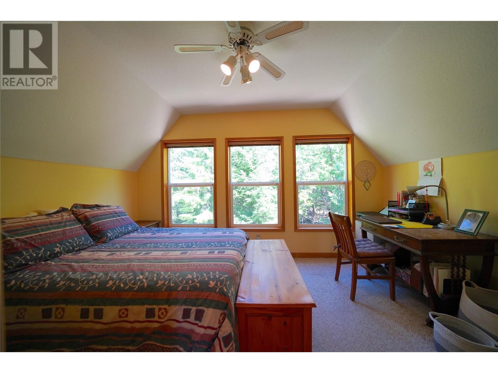 425 Alexander Road, Procter, BC - Indoor Photo Showing Bedroom