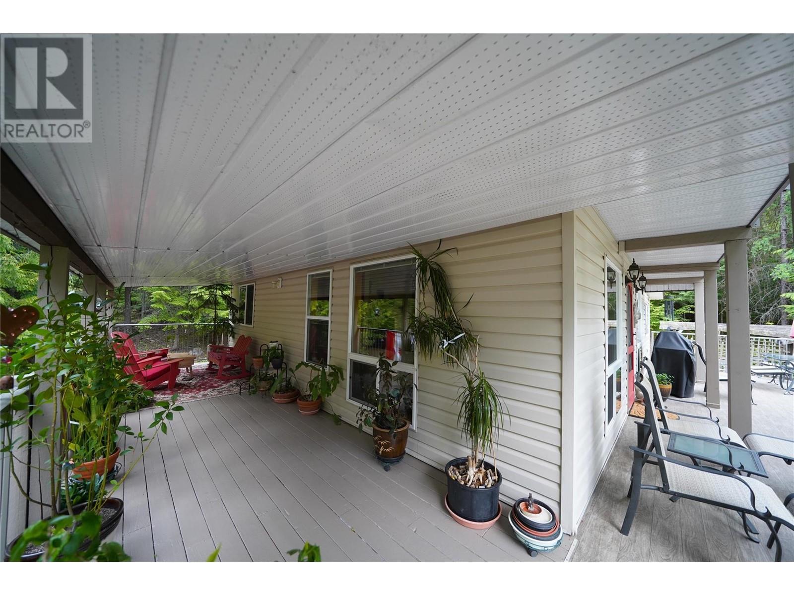 425 Alexander Road, Procter, BC - Outdoor With Deck Patio Veranda With Exterior