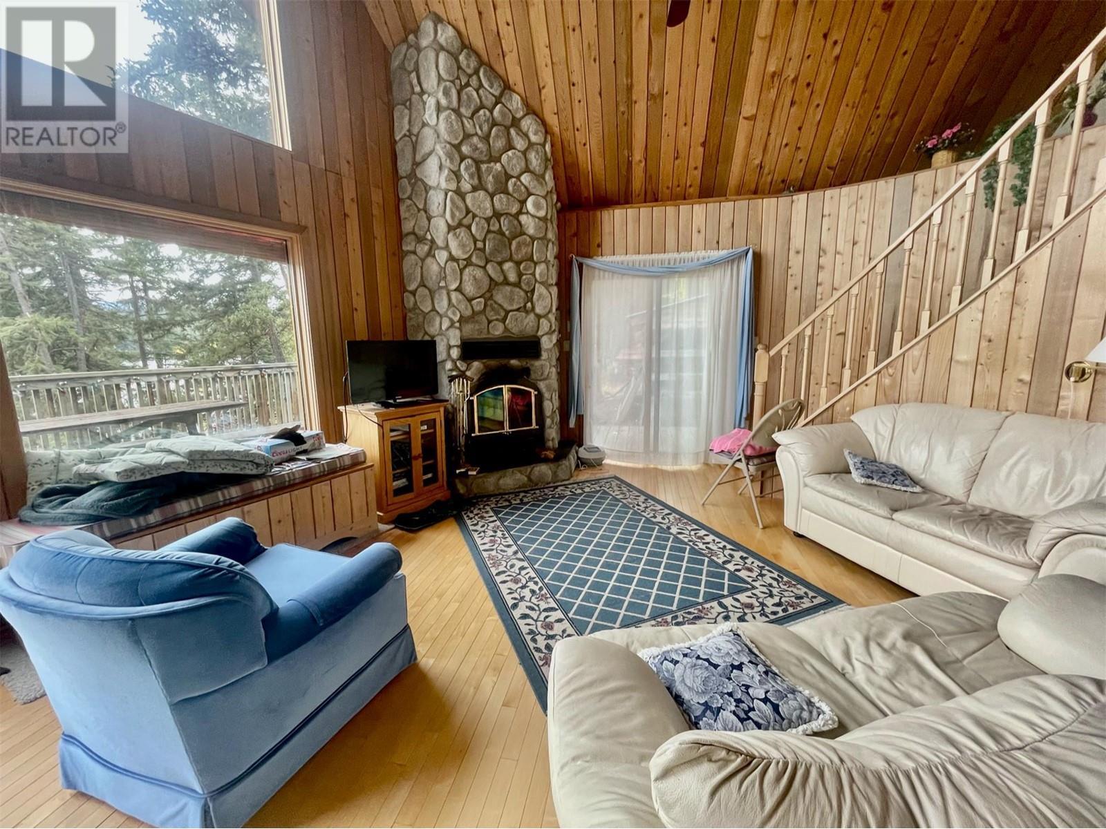 8200 Gun Lake West Road, Gold Bridge, BC - Indoor Photo Showing Other Room With Fireplace