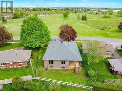 Exterior Back looking south to golf/waterfront -