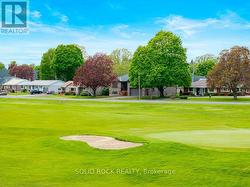 Looking north at home from beautiful golf course. -