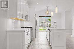 Under counter lighting/pot lights & tile flooring -